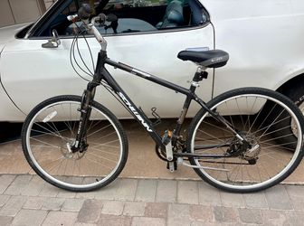 Schwinn Voyageur Hybrid Comfort Bike – 700c Wheels – Front Suspension – Disc Brakes – $135