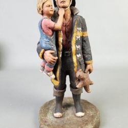 Michael Garman Sculpture – Firefighter Holding Child, Black and Yellow
