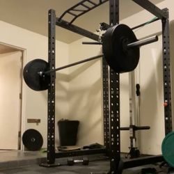 Squat Rack With Barbell And Weights 