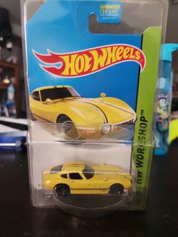 2013 Hot wheels yellow Toyota 2000 GT moc