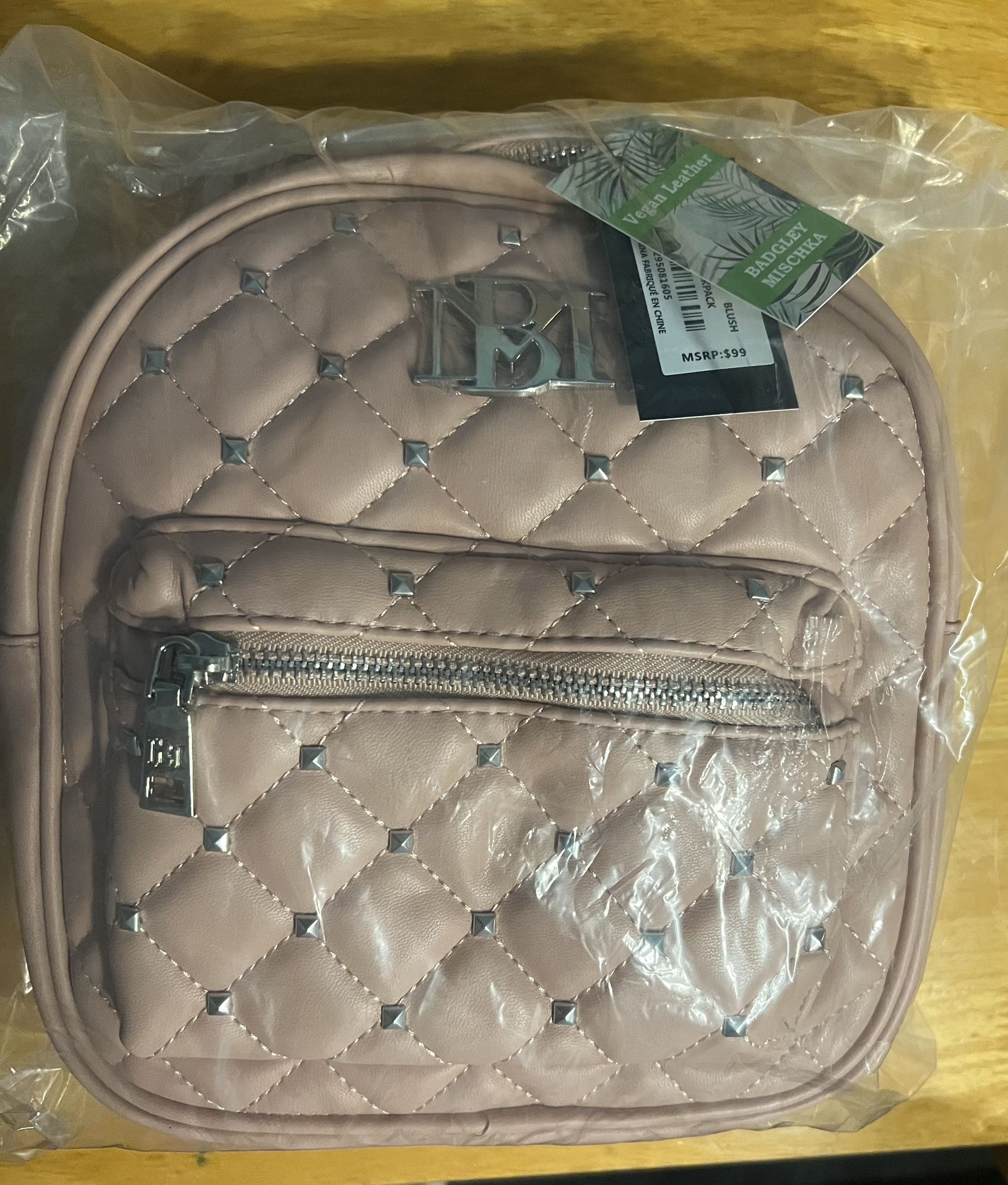 Brand New (Still in Plastic/ W/Tags) Badley Mischka Mini Studded Backpack, MSRP $99 , selling for $40