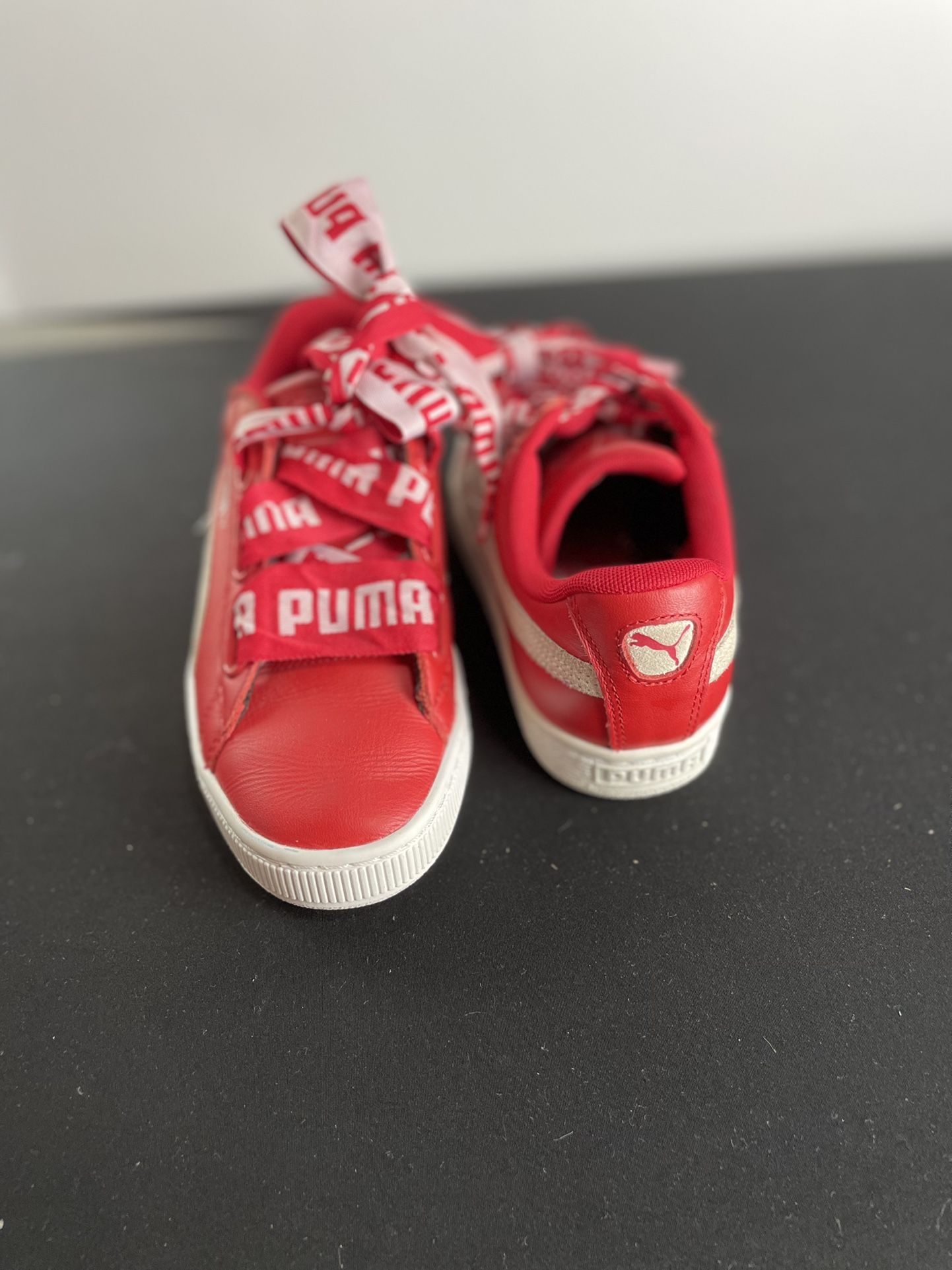 Women’s Red Pumas Size 8.5