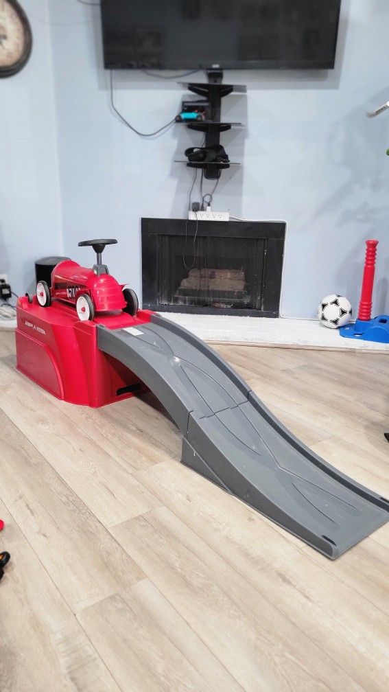 Radio Flyer 500 Toddler Ride on Toy with Ramp and Easy Storage Design