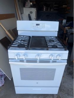 30 inch ge gas range.   Black whirlpool dishwasher