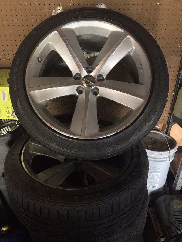 SRT8 challenger factory rims and tires 20in...Please DONT waste my time! Look them up see what there worth...