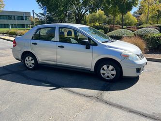 Nissan Versa Silver 4-Door Sedan