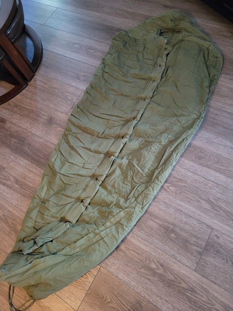 Vintage military mummy bag sleeping bag.