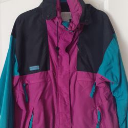 COLUMBIA SPORTSWEAR CO SUPER COMFY COAT W/RADIAL SLEEVES ZIPS DOWN THE FRONT.HOOD IN ZIPPER POUCH HOT PINK,  BLACK, &TURQUOISE VERSATILE,  SIZE L NEW 