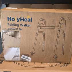 Folding walker. Black. New open box
