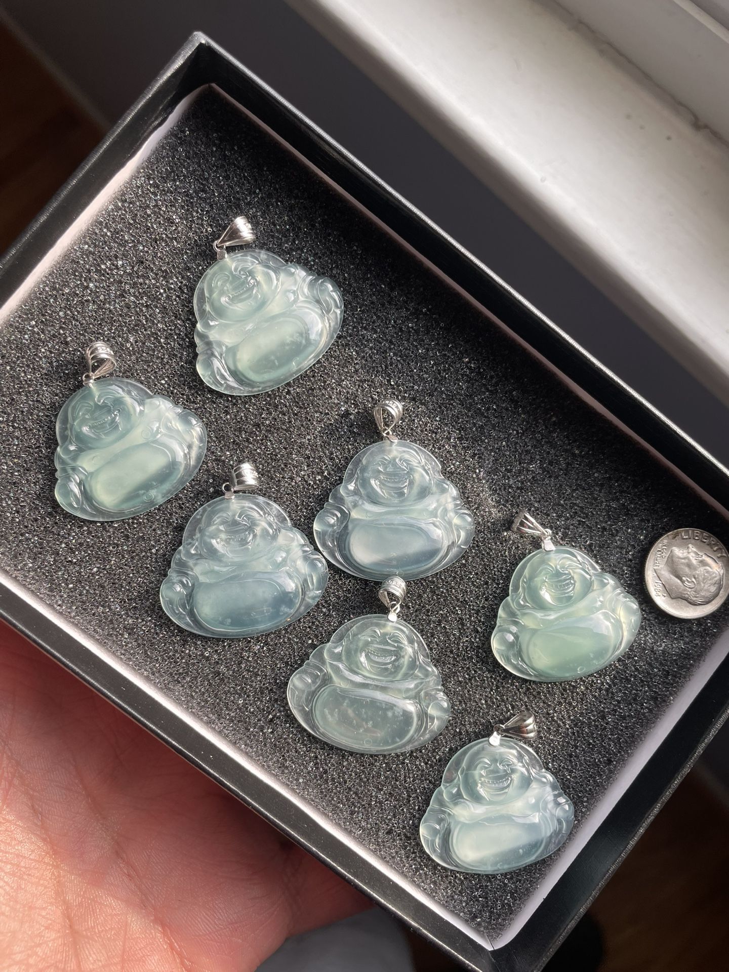 A GRADE UNTREATED JADEITE BUDDHA PENDANTS