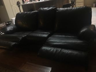 Black leather sofa recliner
