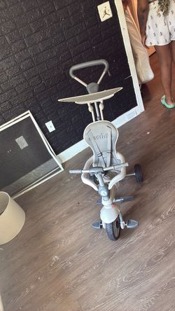 Baby bike and  pusher good for walks and blocks sun