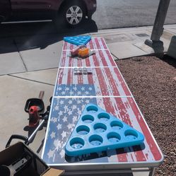 Beer pong table with cups and balls
