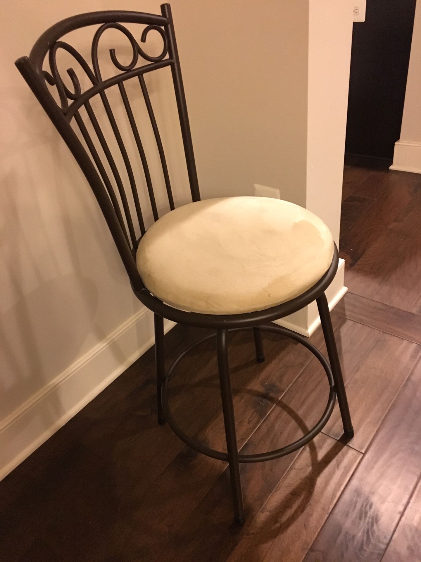 Set of three brown metal swivel bar stools. Normal wear ( good condition)Beige color. $55