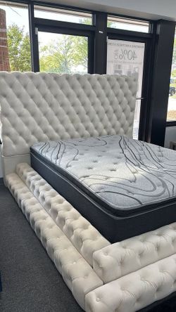 Elegant button-tufted platform bed blends seamlessly w/modern & traditional.