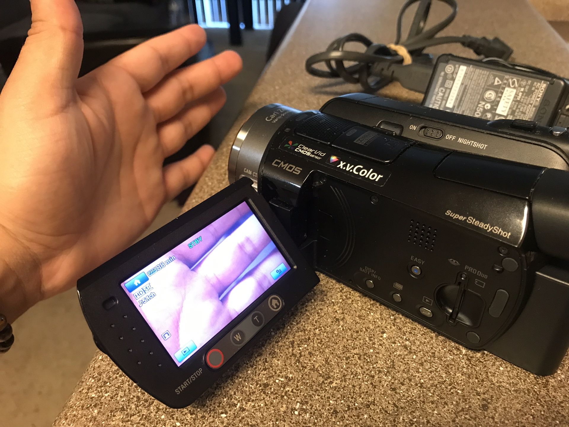 Sony HDRSR7 60GB High Definition Hard Disk Drive Camcorder With Charging Cradle Handycam for