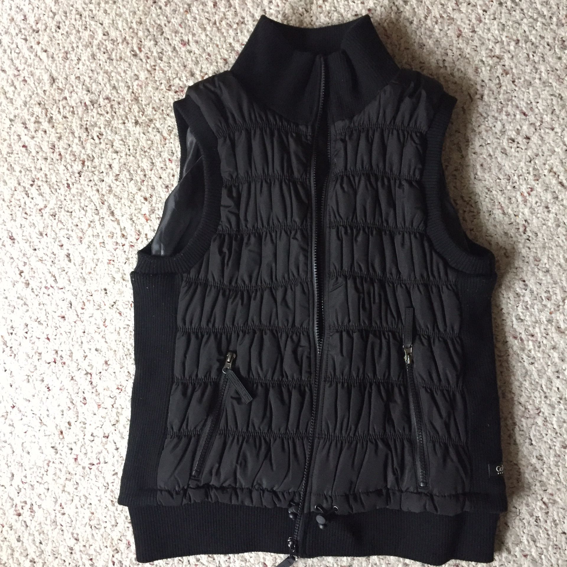 Women XL Calvin Klein Black Puffer Vest with soft sides, shoulder holes and