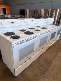 Black and  White Electric and Gas Stoves