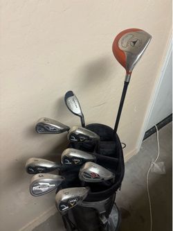Mixed men’s golf clubs with bag