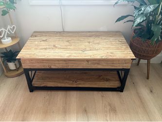 Coffee table lifts up- missing screw wobbly