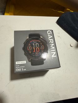 Garmin Fenix 8 Pro 51 mm AMOLED GPS Smartwatch Sapphire Carbon Gray DLC Titanium with Black/Pebble Gray Silicone Band
