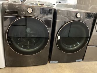LG Thin Q Stackable 4.5 cu.ft. Front Load Washer and 7.4 cu.ft. Electric Dryer Set w/ TurboSteam. New Scratch and Dent