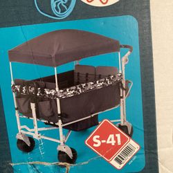 Wagon Stroller It’s Up To 4 Children  brand New box Never Open $230.O.B..O