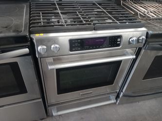 KitchenAid stainless steel 4-burner dual-fuel slide-in range - Free delivery