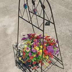 BLACK METAL PLANT STAND WITH FAUX FLOWERS 