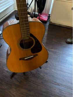 Guitar with stand