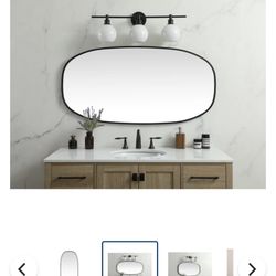 Mirror 24" W x 48" H Black Oval Framed