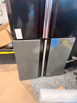 Two Husky steel mounted cabinets