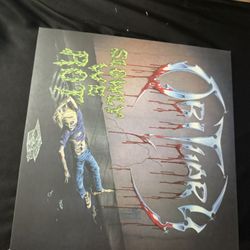 Obituary Vinyl “ Slowly We Rot”