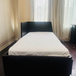 Twin bed Frame free new mattress from bed Beyond's. Length 76. Width 42. Height 15,