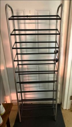 Brand new large shoe rack holds up 30 or more shoes.  ( only used 1 time ).