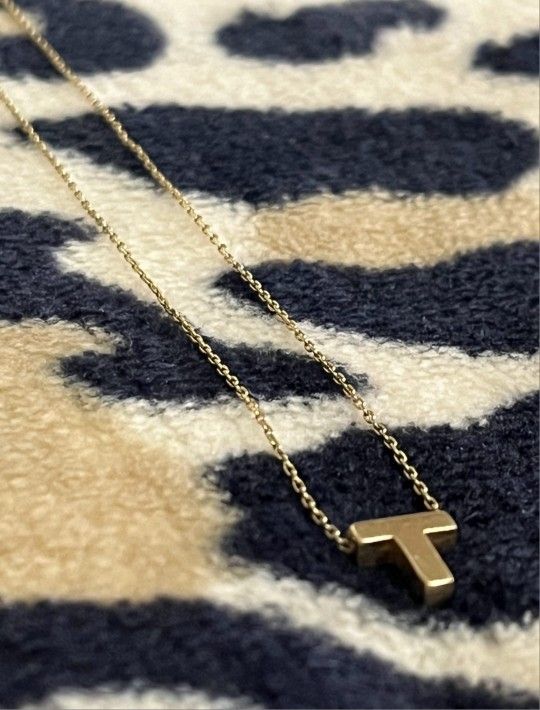 14k Gold Chain With The Letter  T & Also A Cross