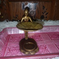 Antique 19th Century Solid Brass Piece Features Detailed Figure Of A Woman Holding A Tray For Sale.