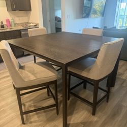 Table W/ 4 High Chairs