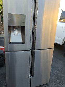 Sansumg refrigerador 4 door in great condition