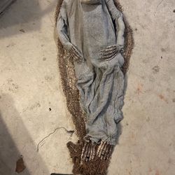 Battery Operated Skeleton Lays In hammock and snores