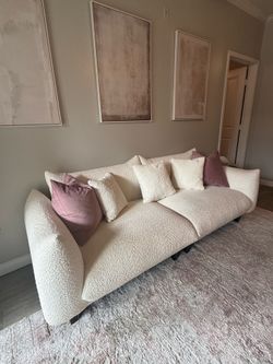 Cream boucle low profile couch