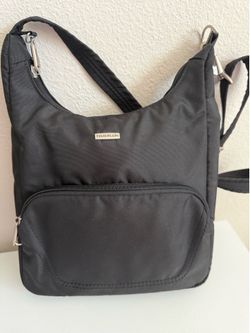Nearly new TRAVELON ANTITHEFT, CLASSIC ESSENTIAL MESSENGER BAG IN BLACK