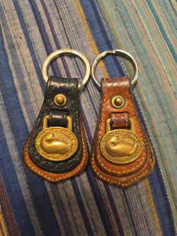 Two Dooney & Bourke key chains