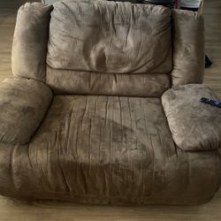 A Recliner Couch, And A Recliner Chair. It’s A Brown Set It For 350.