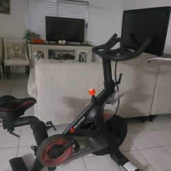 Peloton professional exercise bike is in excellent condition with tennis shoes included

￼


