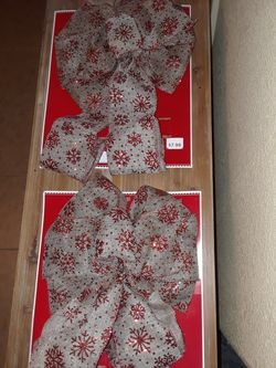 New Xmas bows $6 each($12 for both)