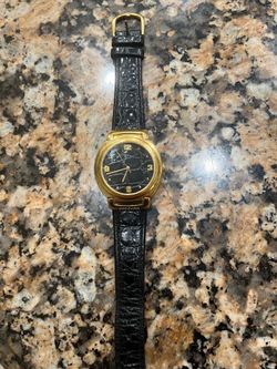 Joan Rivers, black leather strap, gold tone, bezel  watch