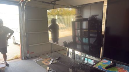Large Flat Screen TV with Stand
