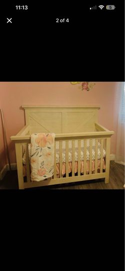 Baby crib and changing topper