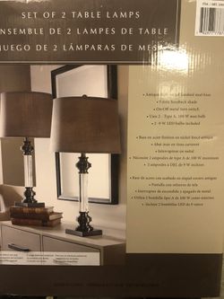 Set of 2 table lamps ( new in the box ) .